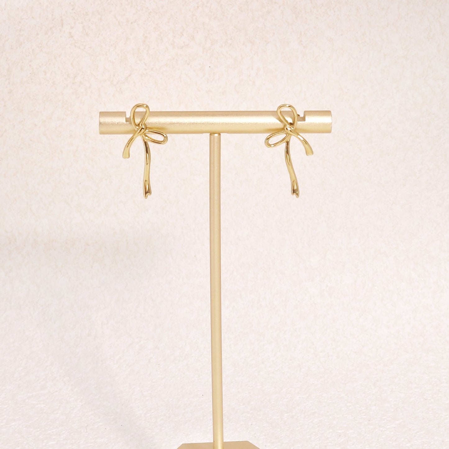 Julietta Minimalist Bow Tie Ribbon Drop Stud Earrings