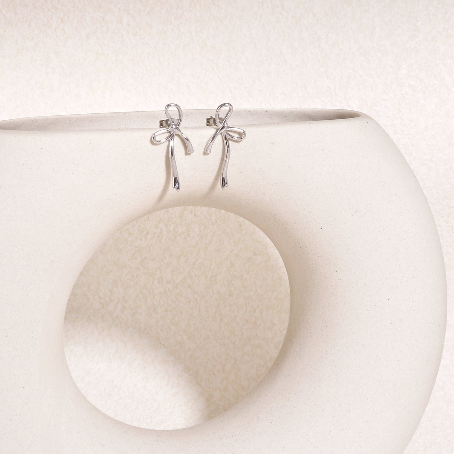 Julietta Minimalist Bow Tie Ribbon Drop Stud Earrings