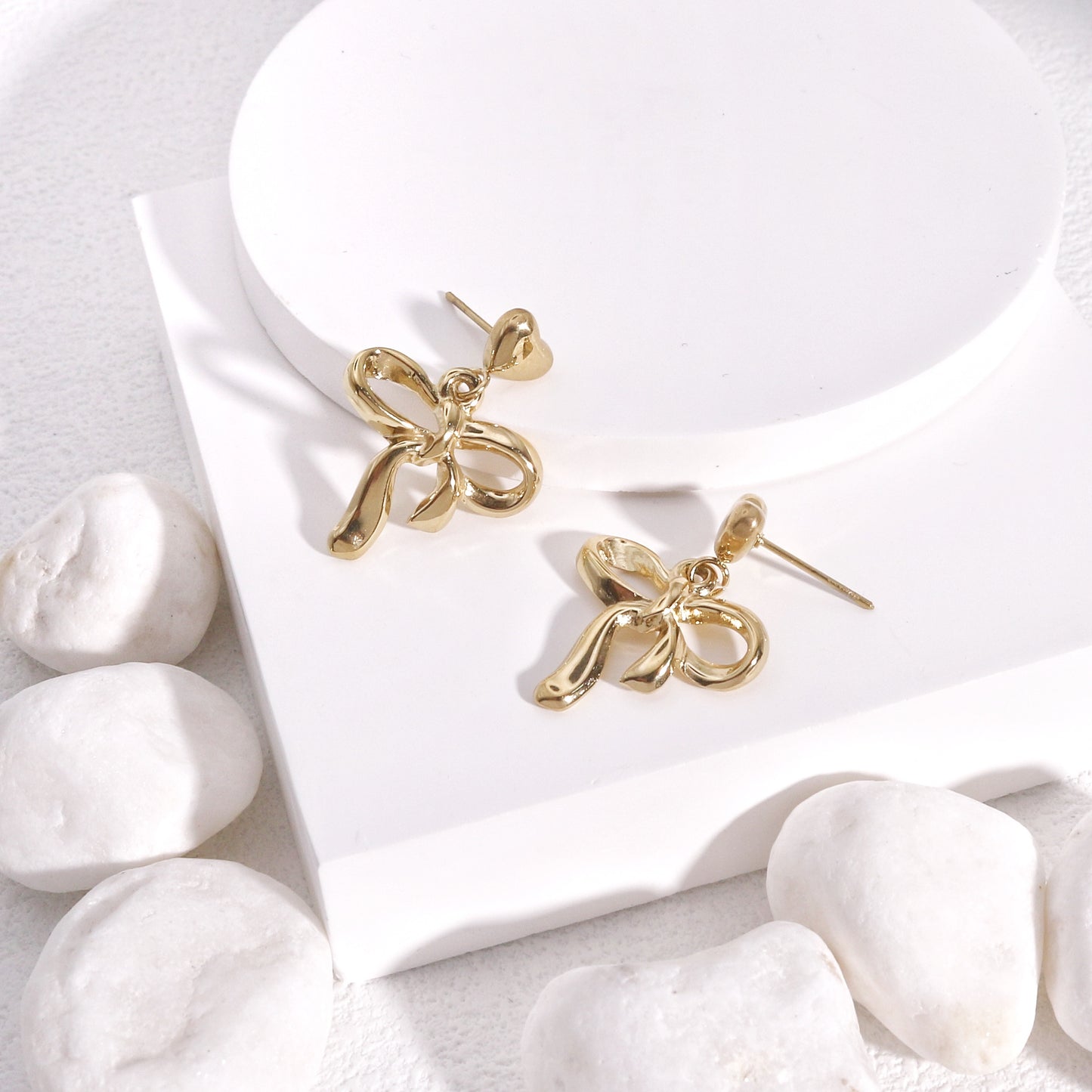 Colette Non-Tarnish Steel Bow Tie Ribbon Dangle Earrings