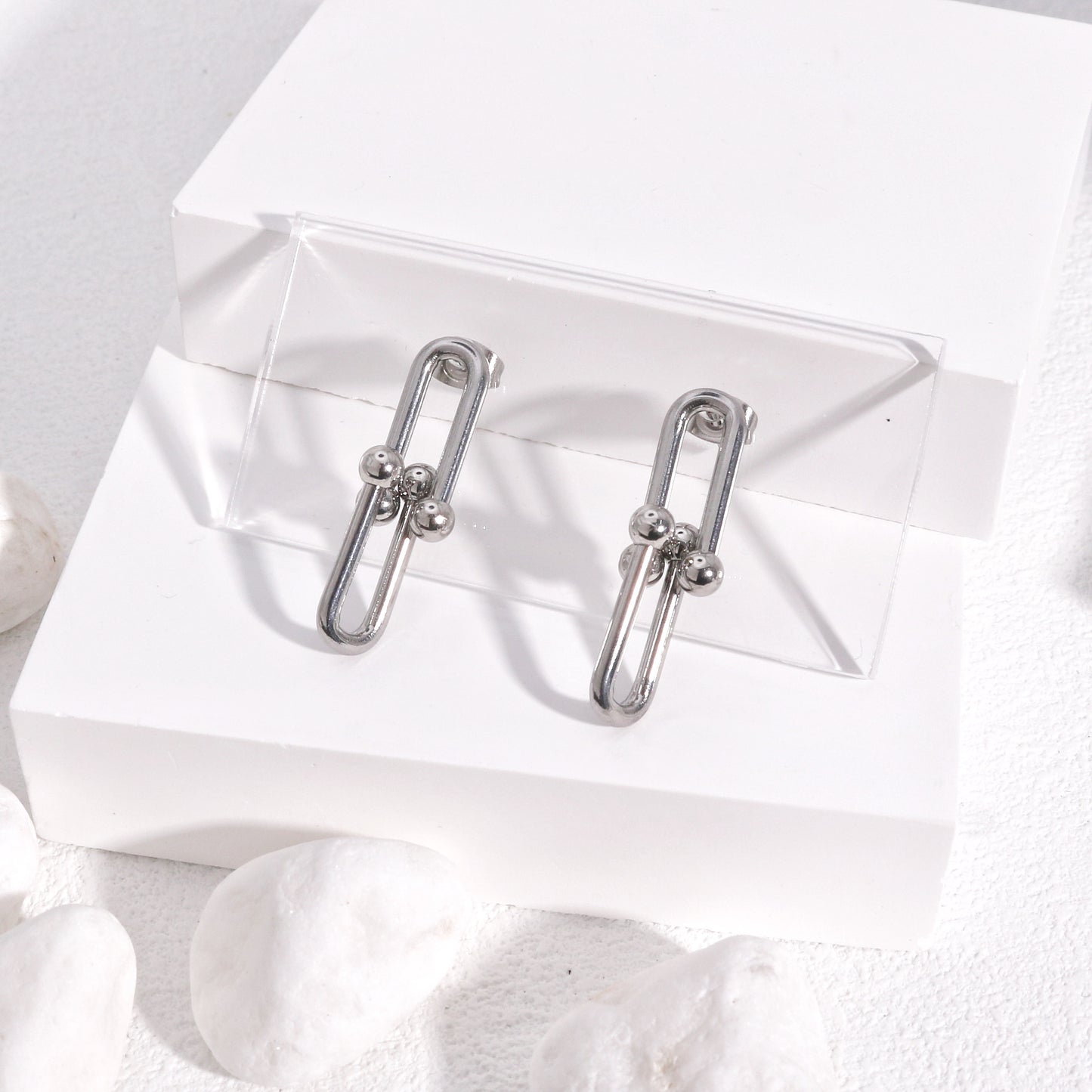 Ellanora Steel Hardware Statement Drop Earrings