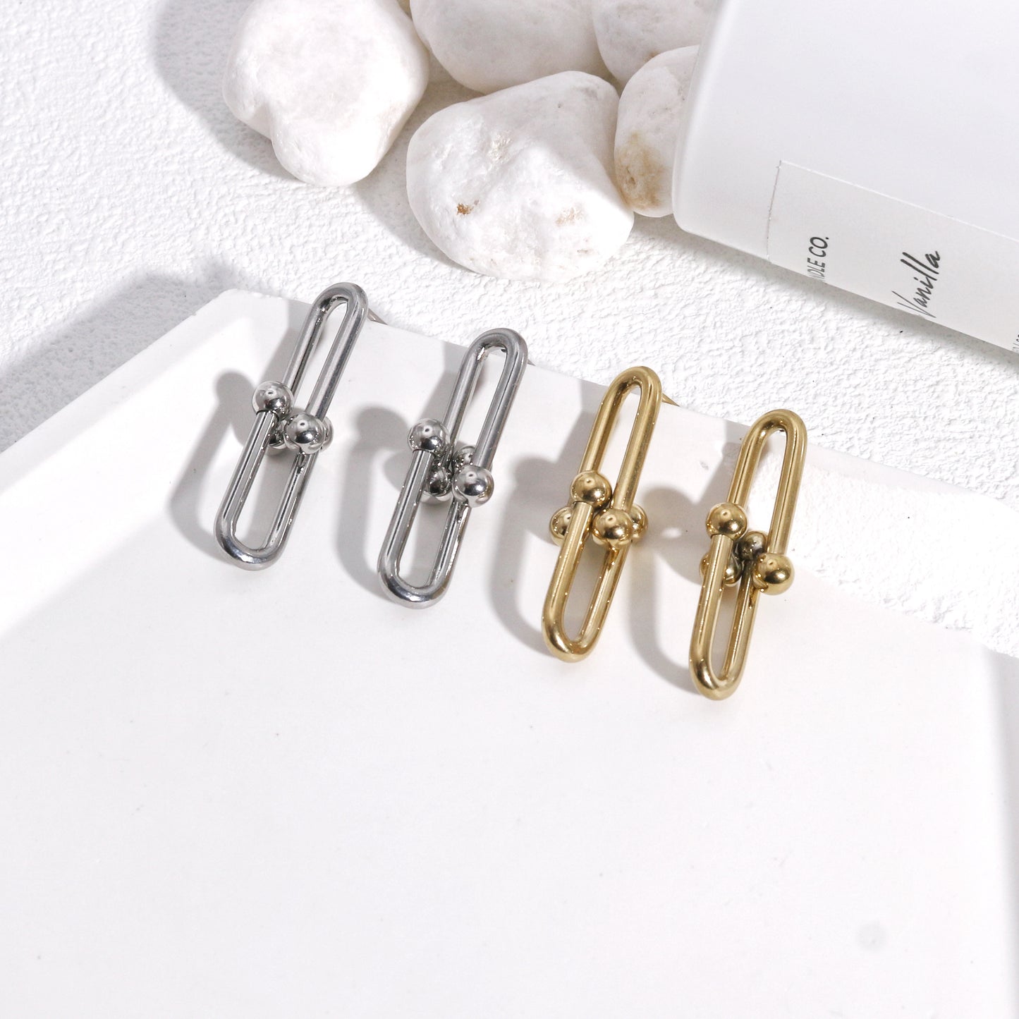 Ellanora Steel Hardware Statement Drop Earrings