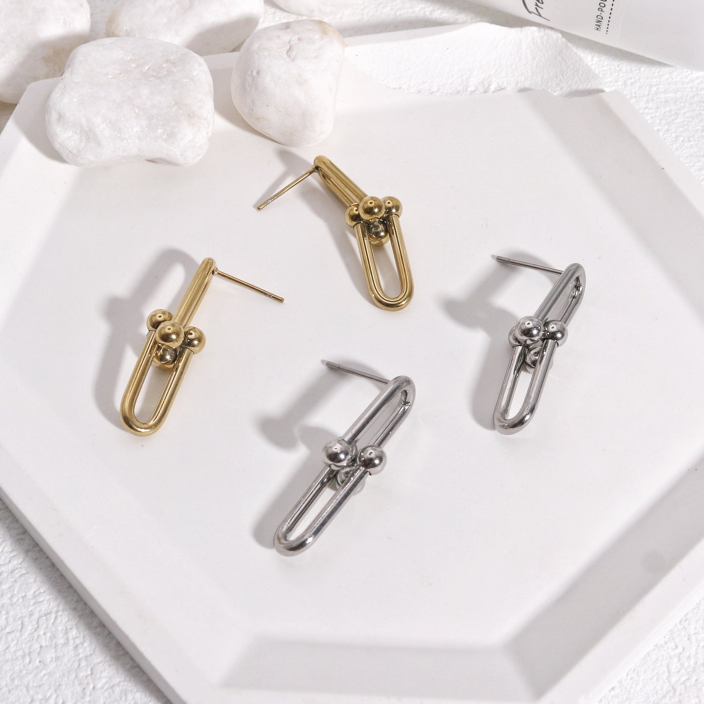 Ellanora Steel Hardware Statement Drop Earrings